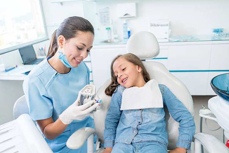 woman-dentist-girl