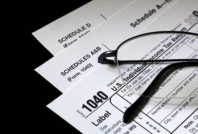tax-forms-with-glasses